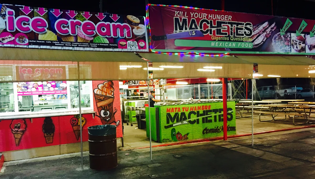 Por Mis Huevos by Machetes business photo